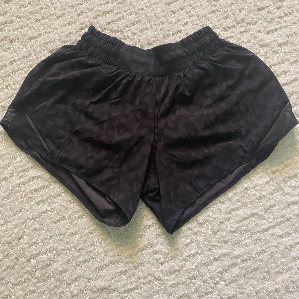 Black cheetah print lululemon hotty hot shorts (4” inseam)